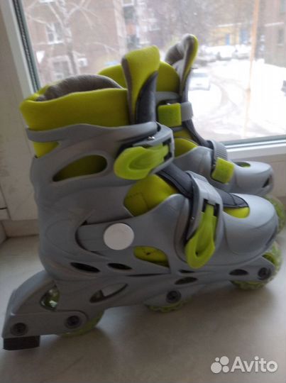 Роликовые коньки