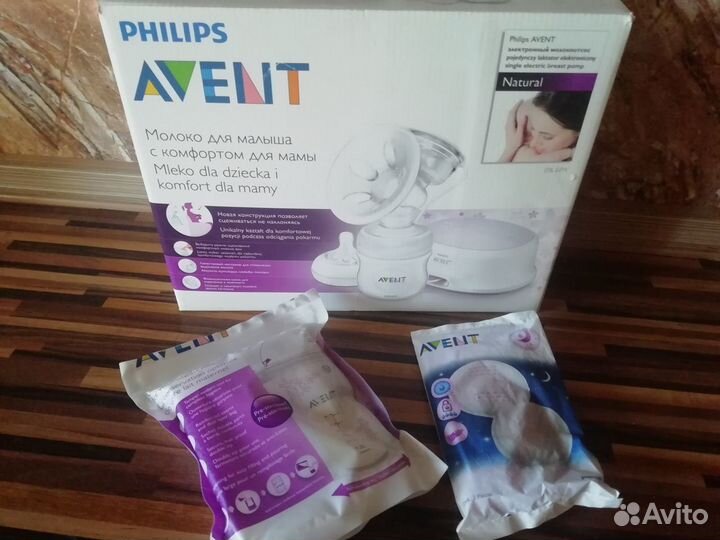 Электронный молокоотсос