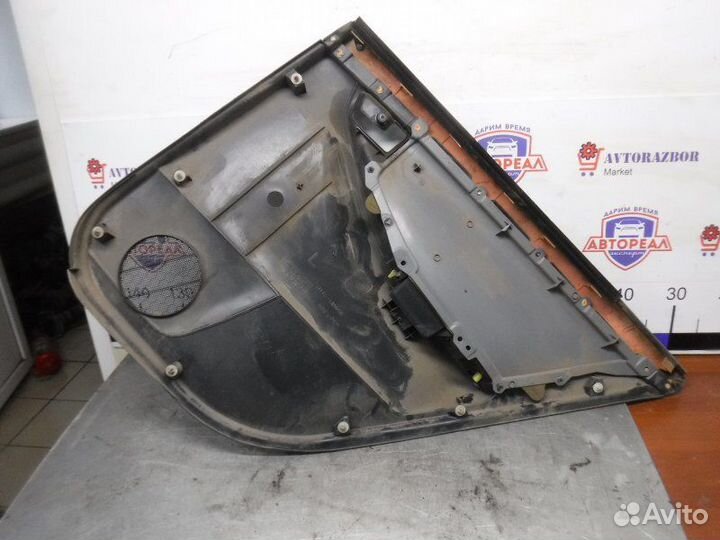 Обшивка двери задняя левая Toyota Corolla 120 4ZZ