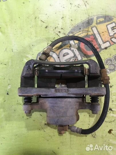 Суппорт тормозной передний левый Chevrolet Lacetti