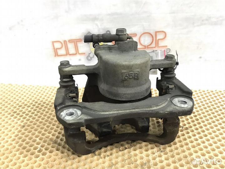 Суппорт передний левый Toyota Camry (ACV40,GSV40)