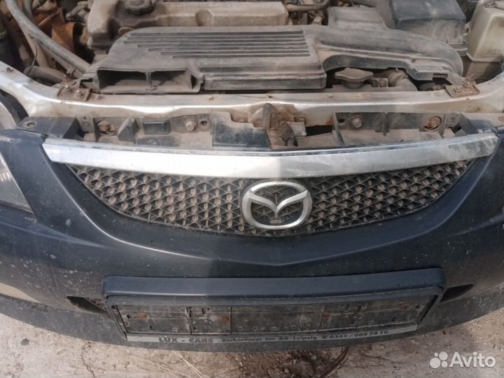 Решетка радиатора Mazda 323 BJ