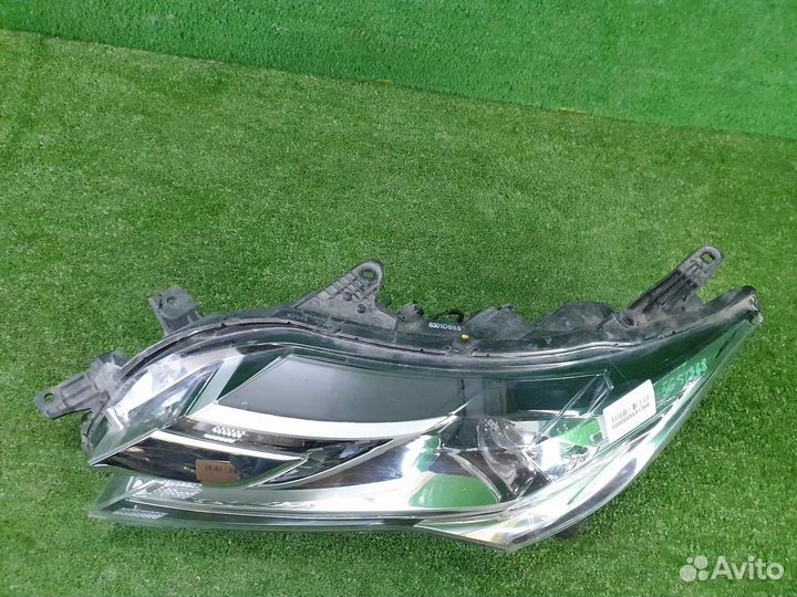 Фара левая Mitsubishi Pajero Sport