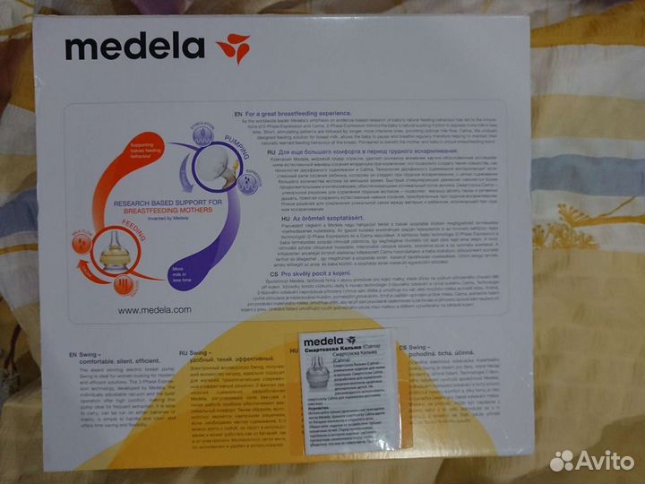 Молокоотсос medela swing электрический