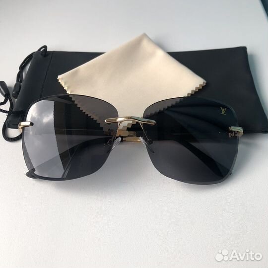 Солнечные очки женские