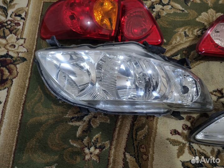 Фара toyota corolla 120
