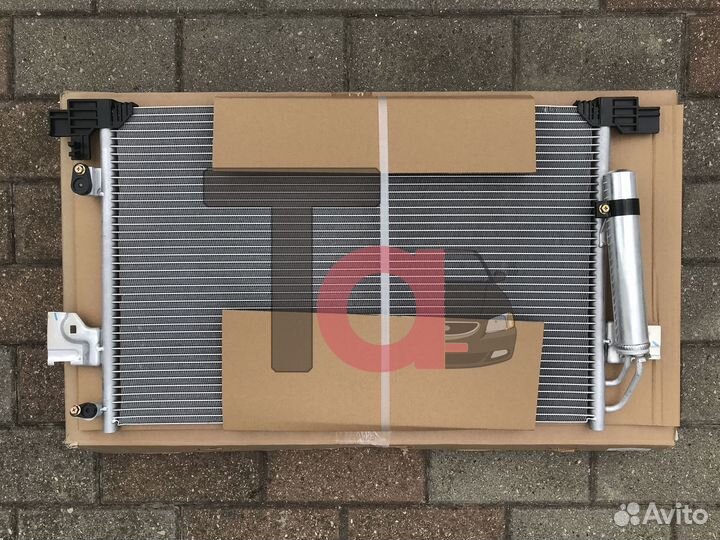 Радиатор кондиционера Lancer X