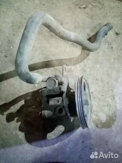 Насос гур Ниссан Алмера 2009г