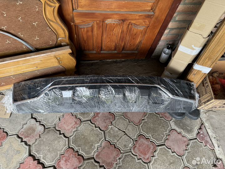 Юбка заднего бампера geely monjaro диффузор