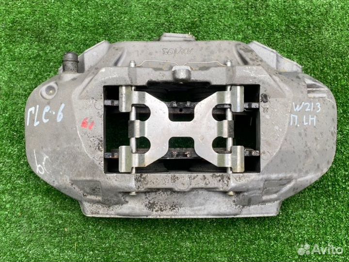 Суппорт тормозной передний левый Mercedes-Benz