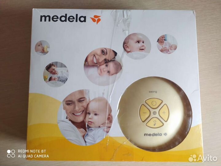 Молокоотсос Medela swing электрический