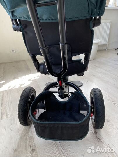 Трехколесный велосипед с ручкой