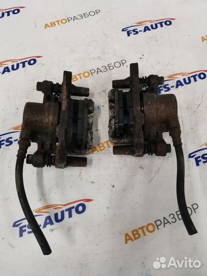 Задние тормозные суппорта Митсубиси Лансер 9