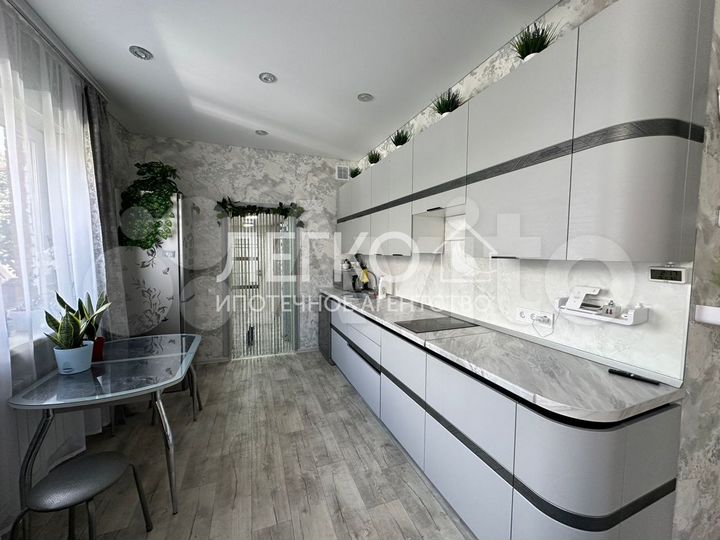 Дом 135 м² на участке 4,5 сот.