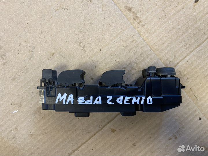 Блок управления стеклоподъемниками Mazda Demio 2
