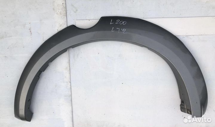 Mitsubishi L200 накладка на крыло заднее левое