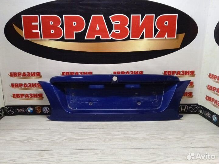 Накладка крышки багажника Nissan Almera N16 QG15