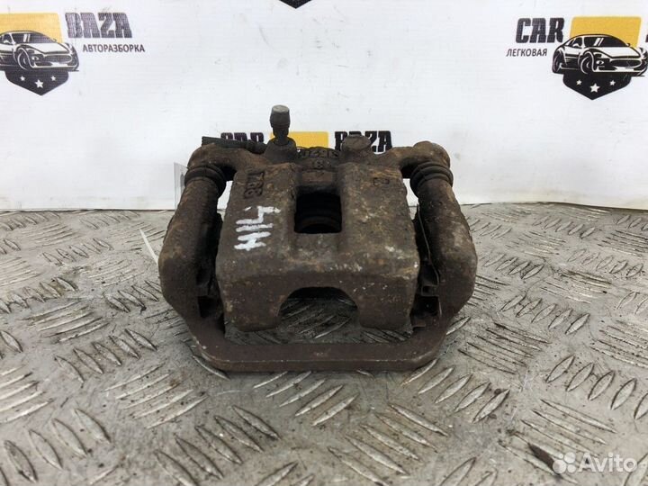 Суппорт задний левый L Nissan X-Trail