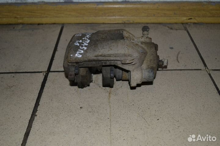 Тормозной суппорт передний правый Volkswagen Jetta