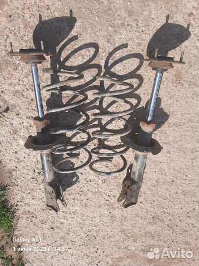 Передние стойки geely mk