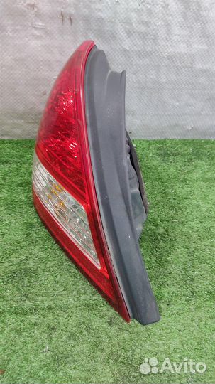 Фонарь задний левый Nissan Tiida 2008