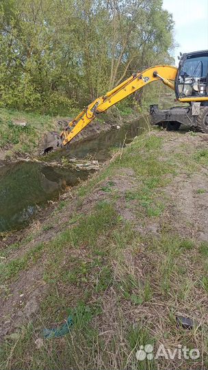 Полноповоротный экскаватор колесный