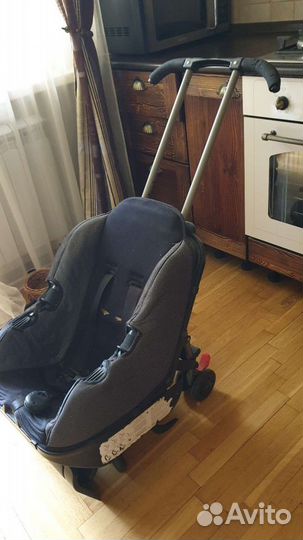 Детское авто-кресло коляска