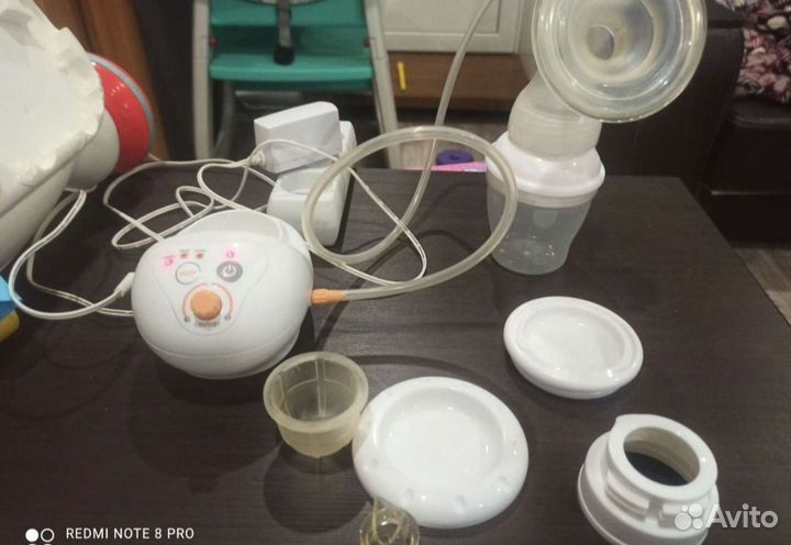 Электрический молокоотсос