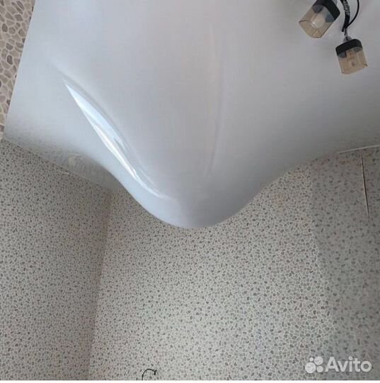 Слив воды с натяжного потолка