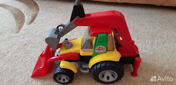 Экскаватор-погрузчик Bruder новый