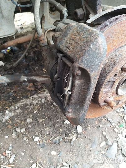 Суппорт передний мазда демио dw3w