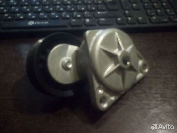 Ролик Натежителя натяжной ремня Ford Focus 1