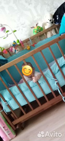 Детская кроватка-маятник