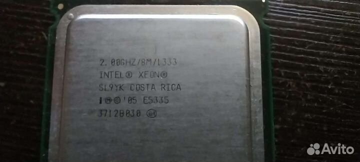 Два процессора Intel Xeon E5335, 4 ядерные