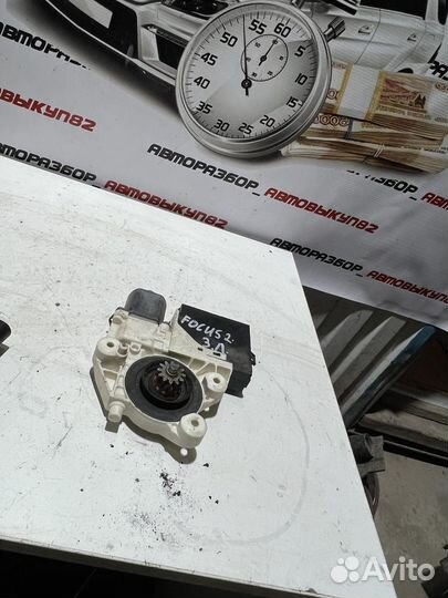 Моторчик стеклоподъемника задний лев. Ford Focus 2