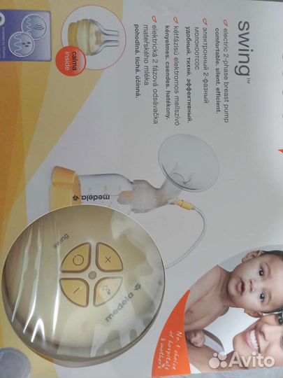 Молокоотсос medela электрический