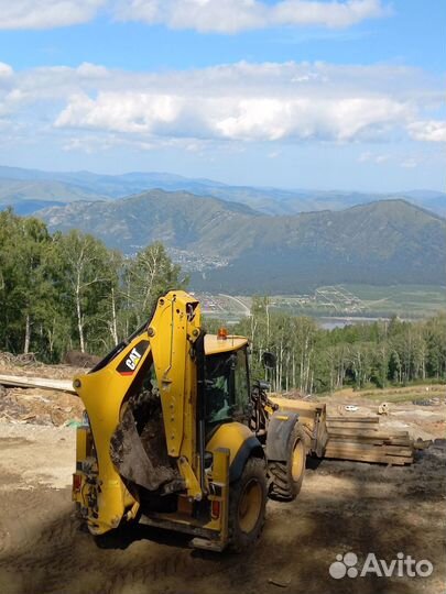 Экскаватор погрузчик caterpillar