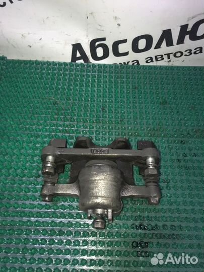 Суппорт тормозной передний левый Chevrolet Spark