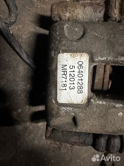 Суппорт задний правый Geely Emgrand Ec7 EC7