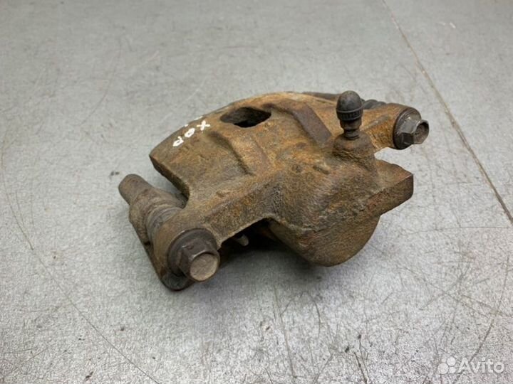 Тормозной суппорт задний левый Mitsubishi Lancer 9