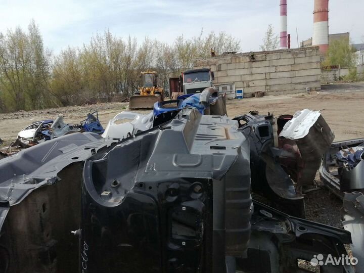 Задняя панель Kia Spectra