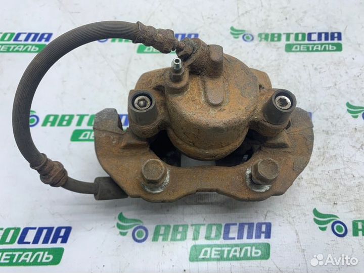 Суппорт тормозной передний левый Mazda 3 BL LF