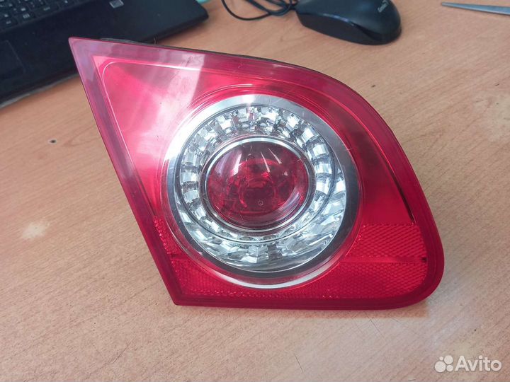 Фонарь левый Пассат Б6