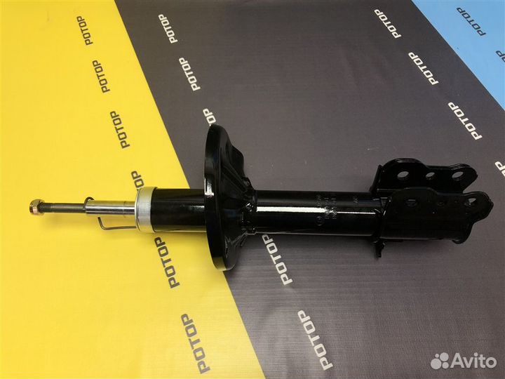 Амортизатор задний правый масляный Mazda 323