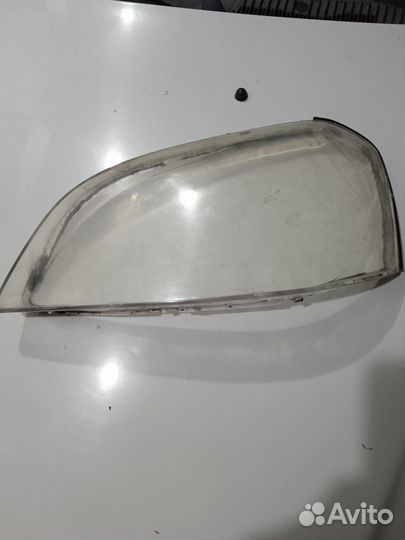 Стекло фары лачетти