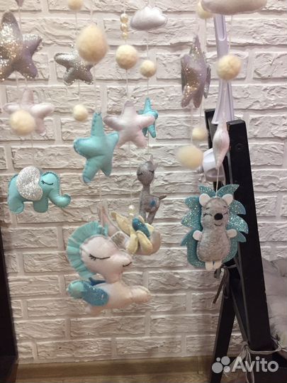 Музыкальный мобиль на кроватку