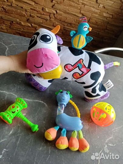 Игрушка музыкальная корова Lamaza