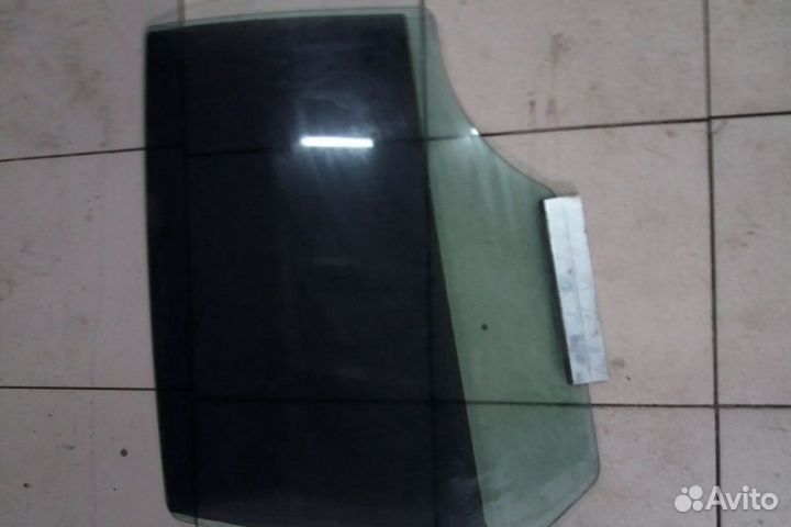 Стекло задней левой двери Opel Astra H