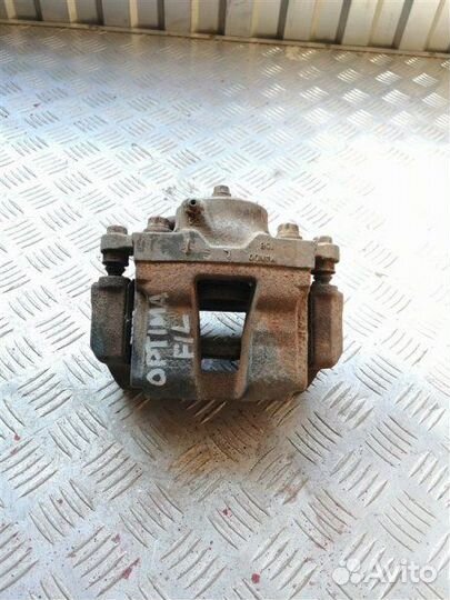 Суппорт тормозной передний левый Kia Optima 3 TF