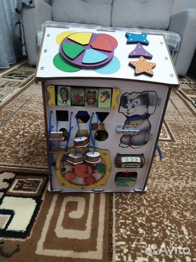 Игрушка развивающий домик